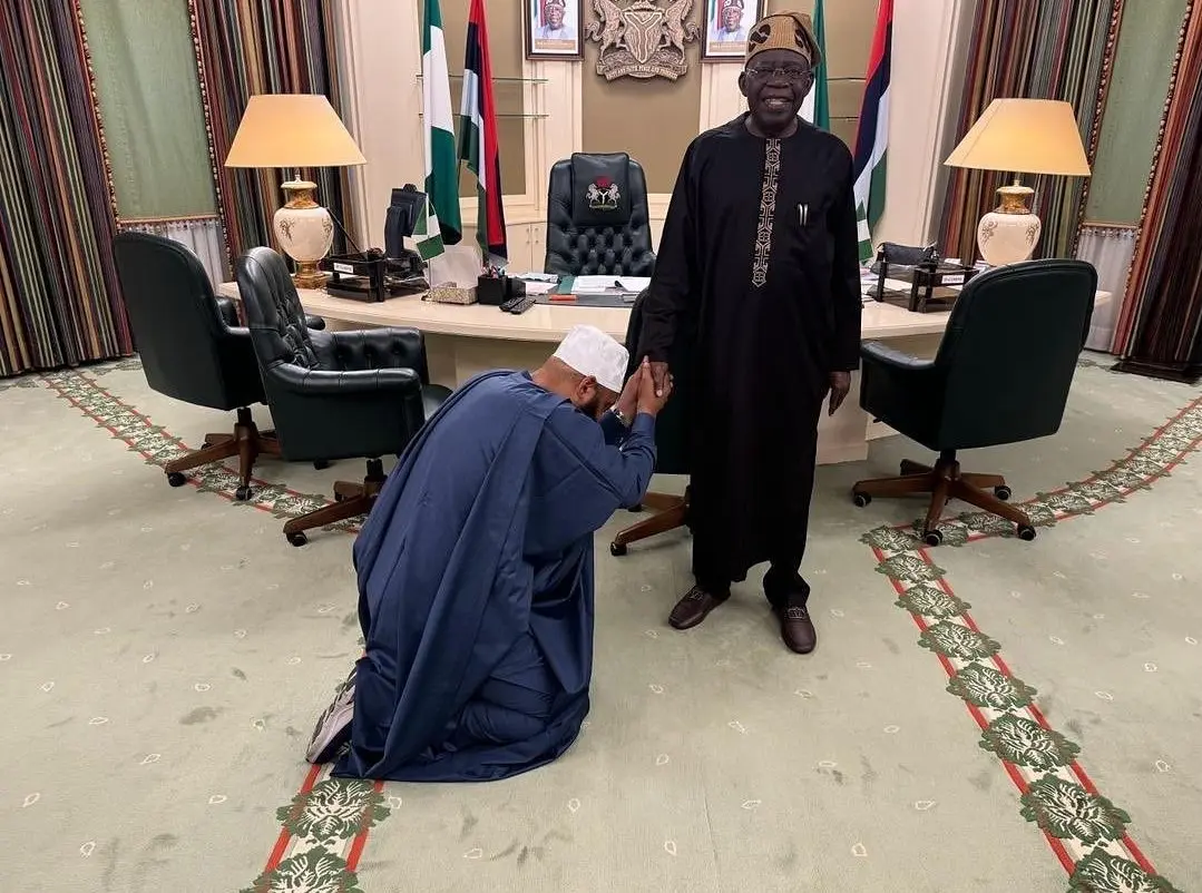 Reactions As Gov Bago Visits, Kneels Before Tinubu