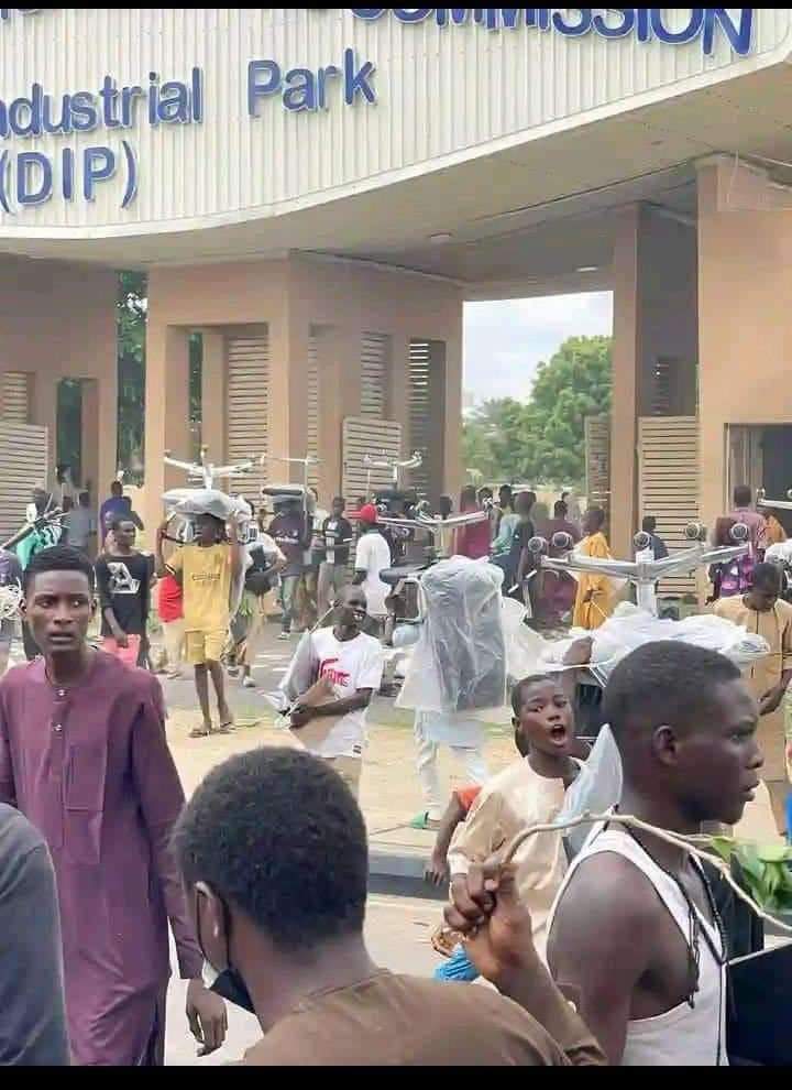 Protesters Loot Billion of Naira Equipment at Kano NCC Office